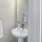 a bathroom with a sink and mirror